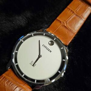 Citizen slim men's 42MM watch with leather band.